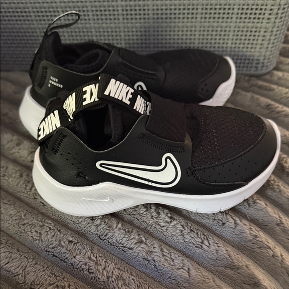 Nike Kids Black and White Slip-On Sneakers - Picture 1 of 4